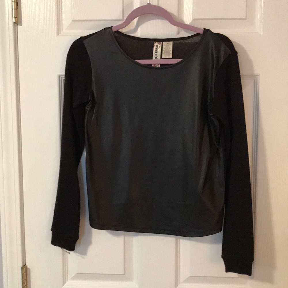 Leather front sweater-like top.